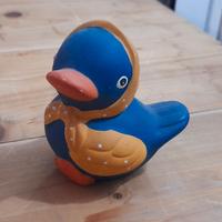 Grazioso pulcino in ceramica blu