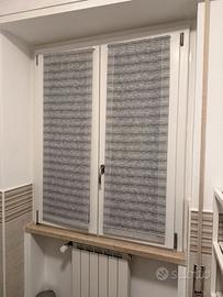 Tende semi-oscuranti