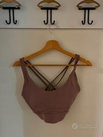 Reggiseno sportivo rosa antico con schiena incroci