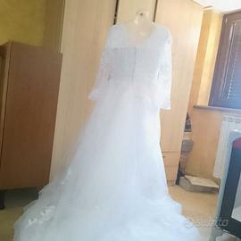 Abito da sposa manica lunga chiusura attività