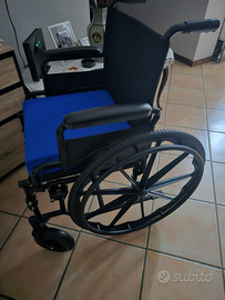 Sedia a rotelle pieghevole