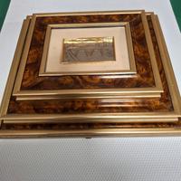 tre quadri laminati in argento 