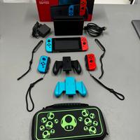 Nintendo Switch con case, 2 joycon extra, sd 128GB