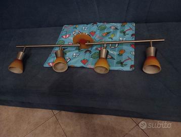 Binario con 4 faretti