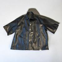 Camicia in ecopelle nera con fiamme ricamate