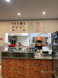 Pizzeria kebab d'asporto con forno a legna