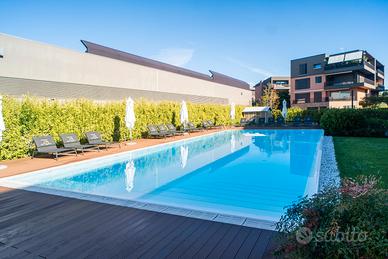 Nuovo 3 camere con giardino e piscina condominiale