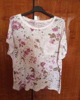 T-shirt con trasparenze in bianco con fiori e pail
