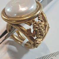 anello con perla coin