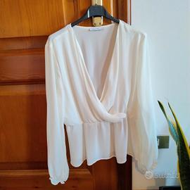 Maglia fluida scollo profondo