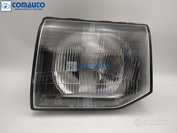 Faro ant sx MITSUBISHI PAJERO II '90
