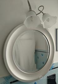 Specchio rotondo bisellato in metallo satinato