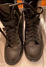 Sneaker in pelle con zeppa