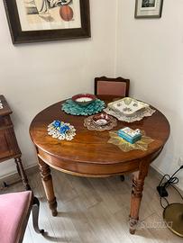 Tavolo tondo allungabile in noce