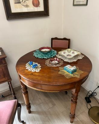 Tavolo tondo allungabile in noce