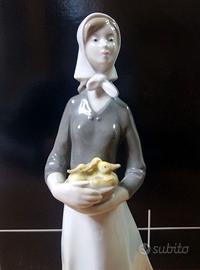 Statua porcellana Gräfenthal donna con anatroccoli