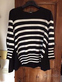 Laboratorio di maglieria esegue capi donna/uomo