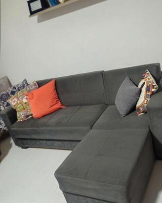 Divano letto con penisola e contenitore