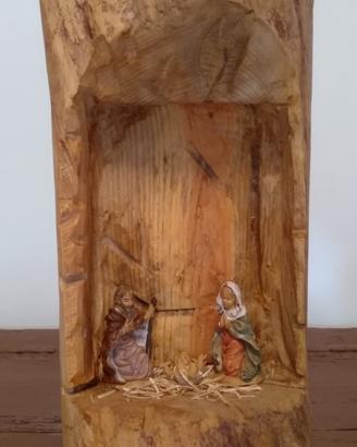 Natività su ceppo in legno