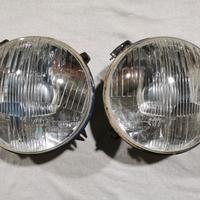 Coppia fari Carello A112 Fiat 850 124 238 1100R
