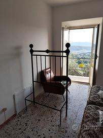 Letto in ferro battuto anni 40 ad una piazza
