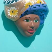 vaso ,capeza de terraccotta  da appendere al muro