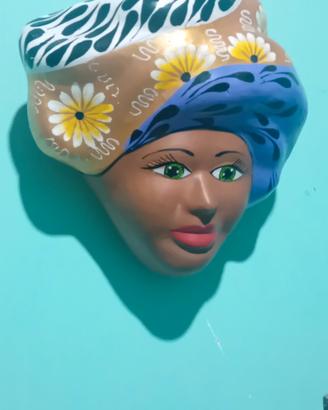 vaso ,capeza de terraccotta  da appendere al muro