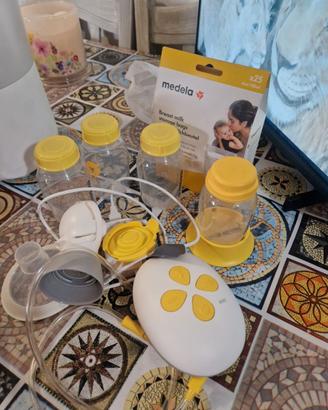 Tiralatte medela