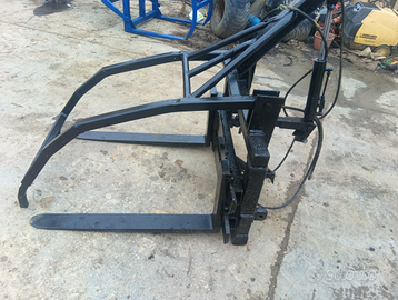 Forca con trattenitore per legna