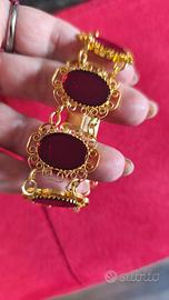 braccialetto rosso e oro 