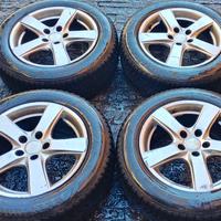 Cerchi auto marca MAK con gomme e cric idraulico