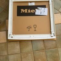 Collegamento colonna bucato Miele