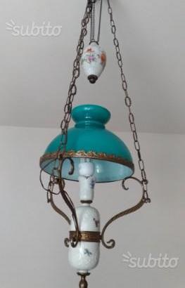 Lampadario sali scendi in ceramica e ottone