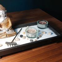 Giardino Zen con Buddha e portacandele