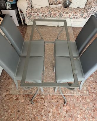 Tavolo in vetro e ferro battuto