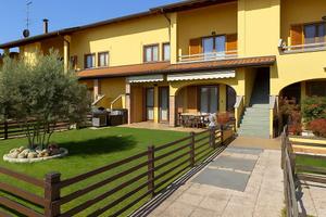 Appartamento con giardino privato e piscina