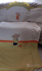 Piumone e paracolpi per culla