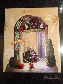 altalena di Natale con luci e musica 