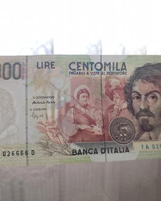 Banconota 100000 Caravaggio con numeri uguali. 