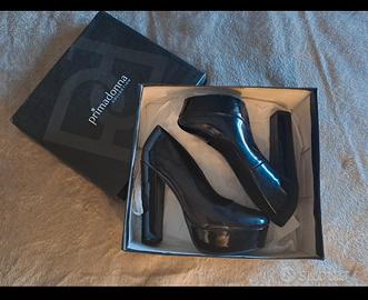 Tacchi décolleté lucidi, plateau e tacco