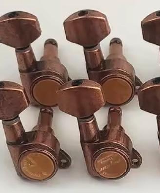 Meccachine bronzo chitarra elettrica