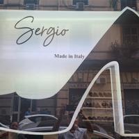 insegna luminosa bifacciale.