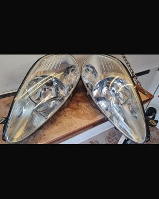 Fanali anteriori fiat grande punto spinotto viola