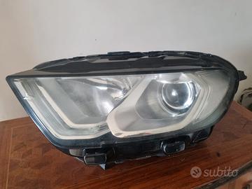 Faro sinistro Ford Escort