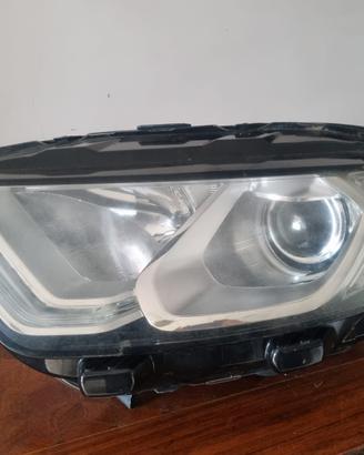 Faro sinistro Ford Escort