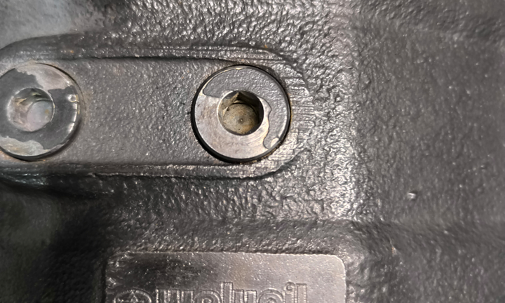 Distributore per caricatore frontale