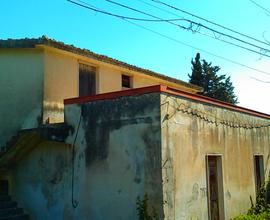 Terreno con fabbricato vicino palazzolo