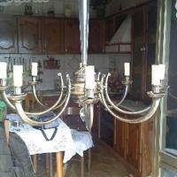 Lampadario a otto luci in ottone bronzato