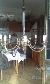 Lampadario a otto luci in ottone bronzato