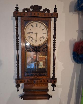 Antico orologio da parete